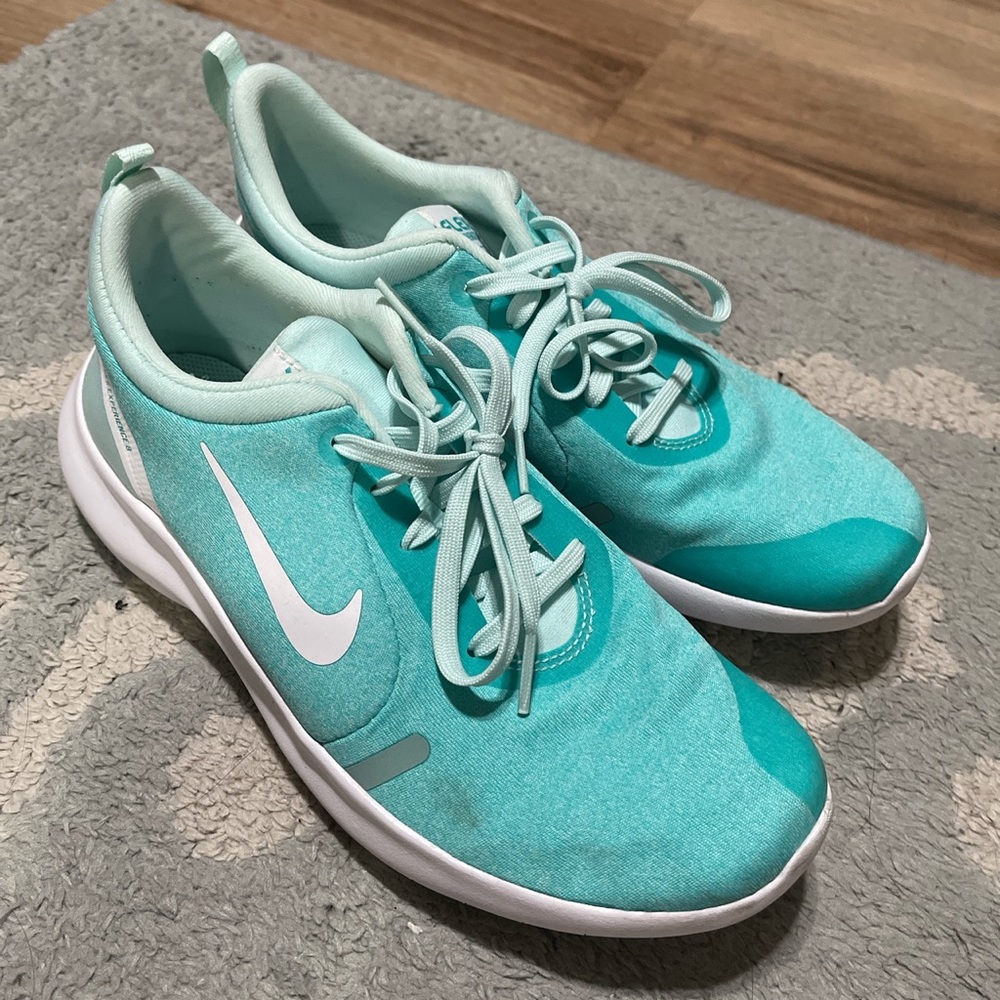Nikes - image 1